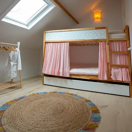 'a Little White House With A Tree By The Sea' With By Bloss