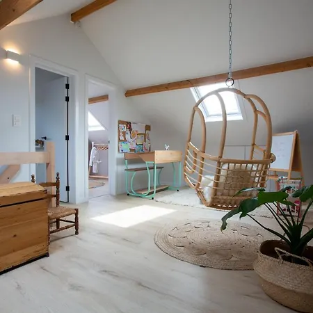 'a Little White House With A Tree By The Sea' With By Bloss