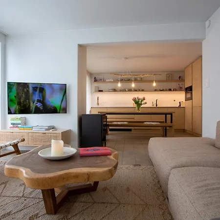 'a Little White House With A Tree By The Sea' With By Bloss